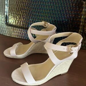 Michael Kors light pink sandal.